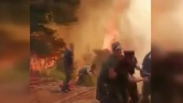 Azerbaycanlı ekipler yangında canla başla mücadele verdi! Alevlerin arasından böyle kurtuldular
