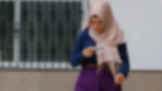 Başörtüsü nedeniyle genç kızı darp eden kadın tutuklandı
