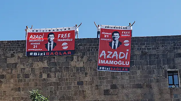 Diyarbakır'da surlara asılan 'İmamoğlu' pankartlarına polis el koydu