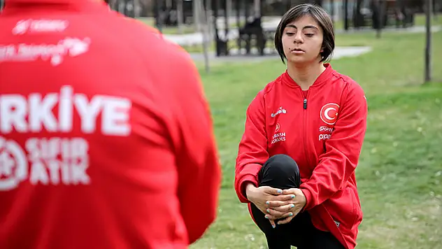 Down sendromlu şampiyon atlet, kilo vermek için başladığı sporda başarıya koşuyor

