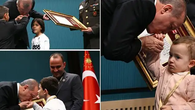 Erdoğan, çocukların ellerini öptü