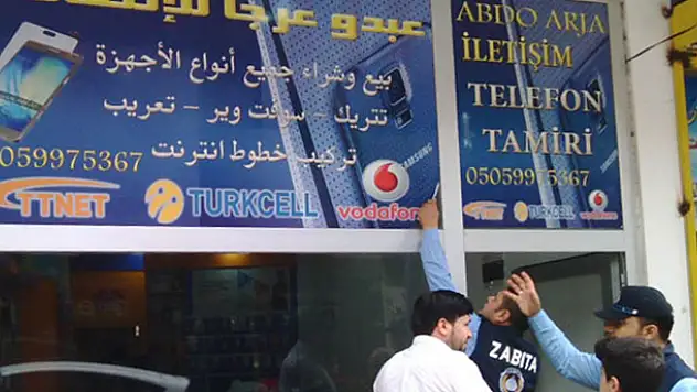İskenderun'da Arapça tabelalar kaldırılıyor