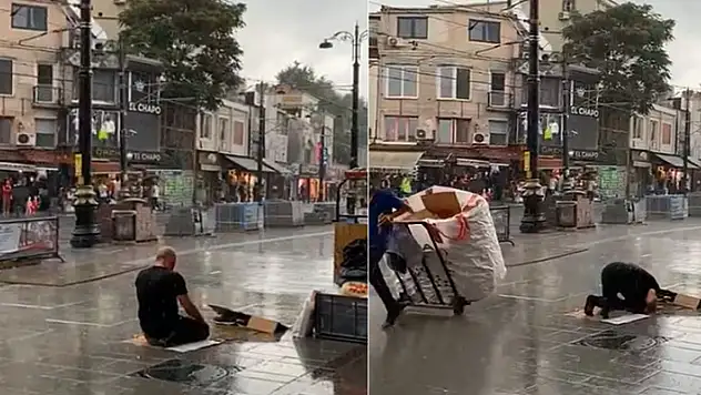 İstanbul Fatih'te bir vatandaş sağanak yağmur altında namaz kıldı
