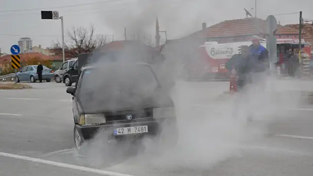 Otomobildeki yangını beton mikseri söndürdü