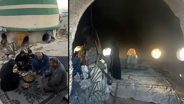 Ramazan ayının buruk geçtiği Gazze'de Filistinli aile yıkılan caminin kubbesinde iftar yapıyor