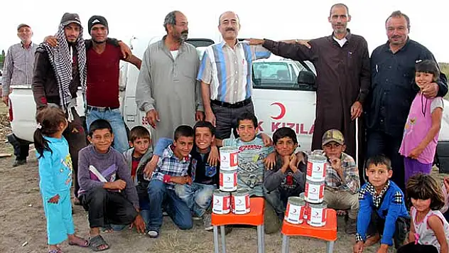 Seydişehir'de Suriyeli tarım işçilerine kavurma dağıtıldı
