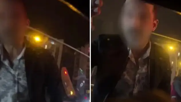 Taksicinin kendisine 'selektör' yapan otomobilin önünü kesip, sürücüye yumruk atmaya çalışması kamerada
