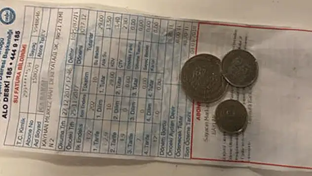 Yolda bulduğu su faturasının borcunu ödedi