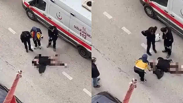 Yolun ortasında yatan kadın, sinir krizi geçirdi