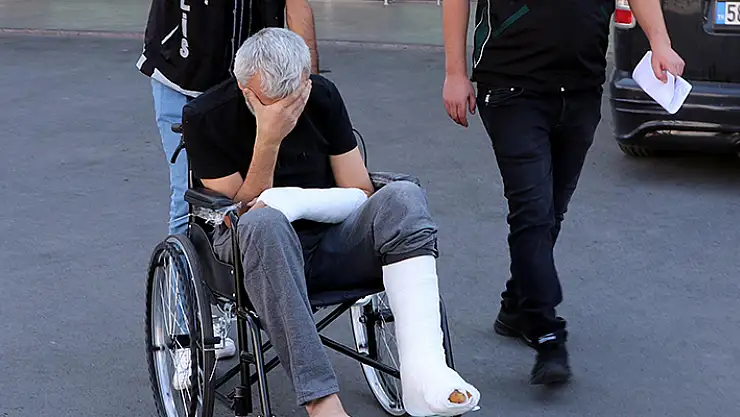 Polisten kaçarken ayağını ve kolunu kıran şüpheli, tekerlekli sandelye ile adliyede

